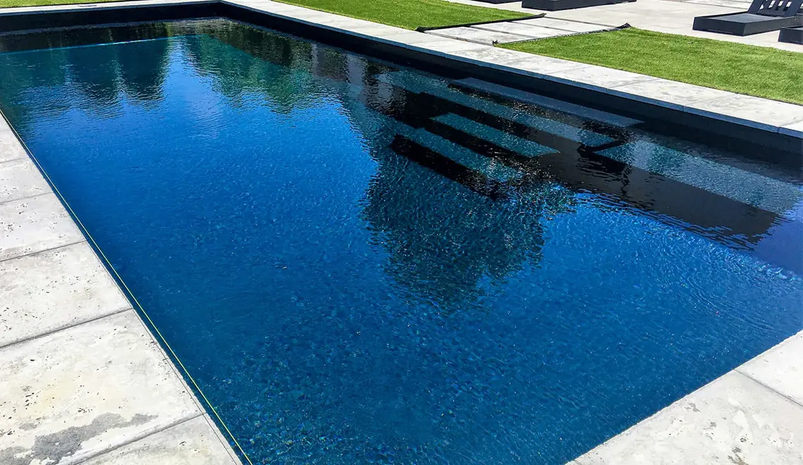 The Grand rectangular fiberglass pool with great side entry steps from Leisure Pools Northern Kentucky